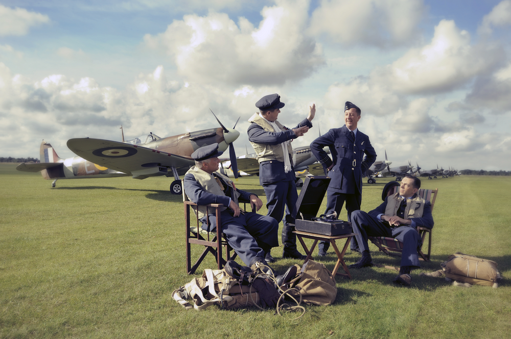 RAF Spitfire pilots talking at an airfield